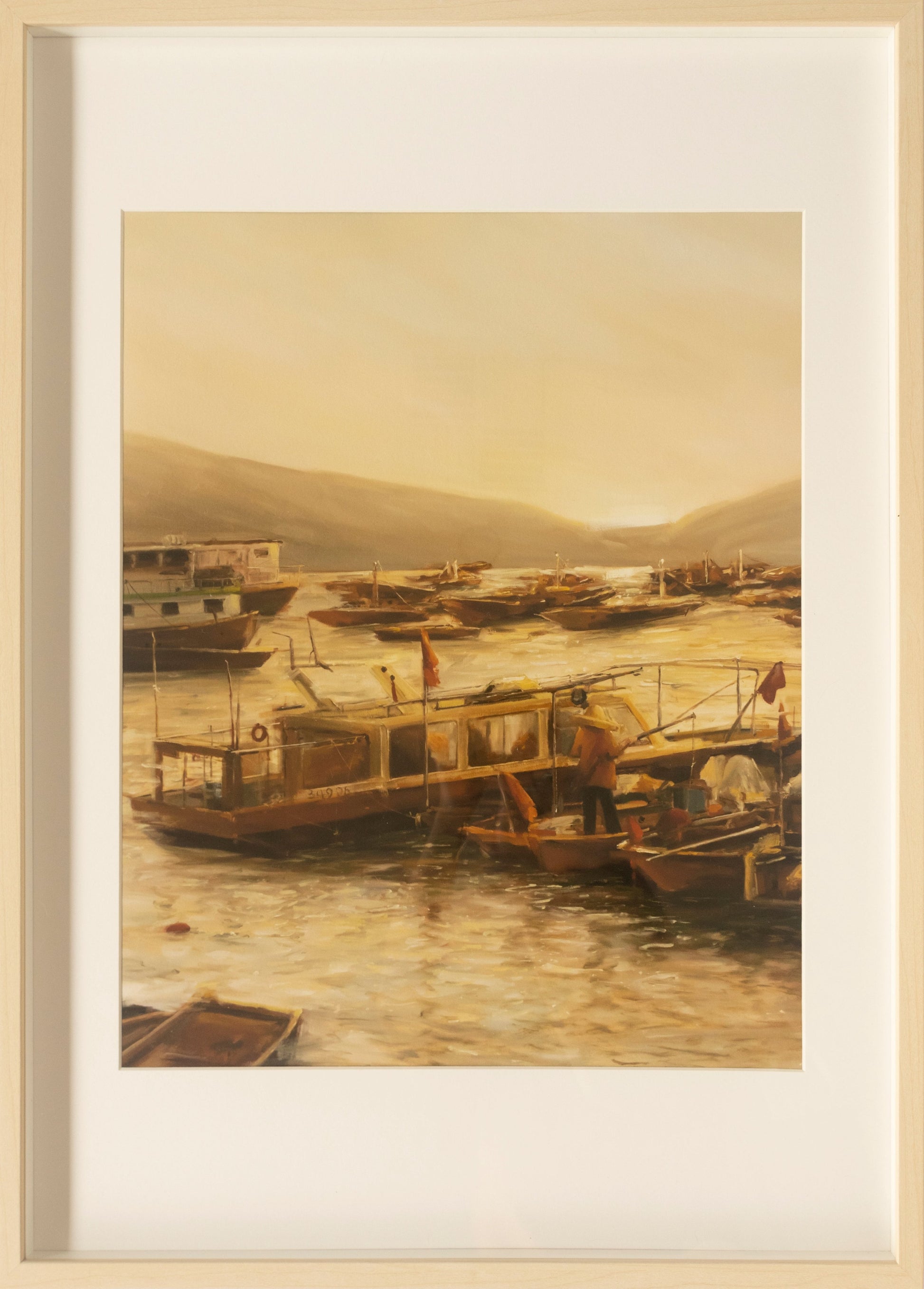 Limited edition art print titled 'Ocean Wanderers' featuring a serene seascape at dawn with fishing boats and a lone fisherman against a golden sunrise.