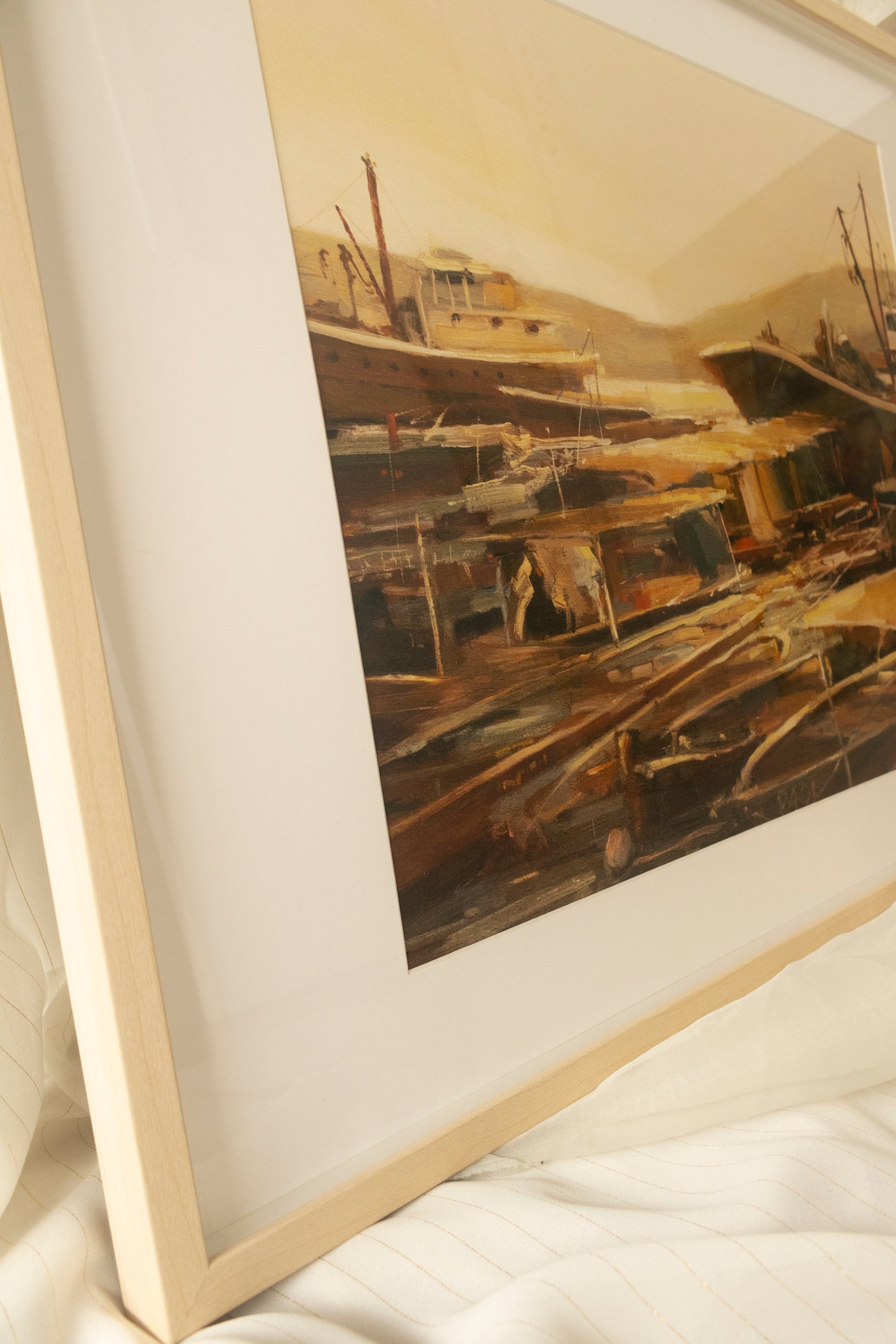 Side view of the limited edition art print titled 'Swinging,' depicting fishing boats gently swaying in a serene harbour scene.